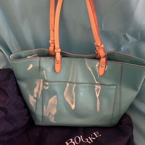 Dooney & Bourke aqua patent leather bag.